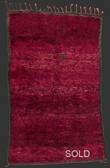 TM 2299, mystic rug with a small unfinished diamond design embedded in endless variations of deep burgundy colour, probably from the eastern part the Middle Atlas, Beni Mguild or Marmoucha, Morocco ...more